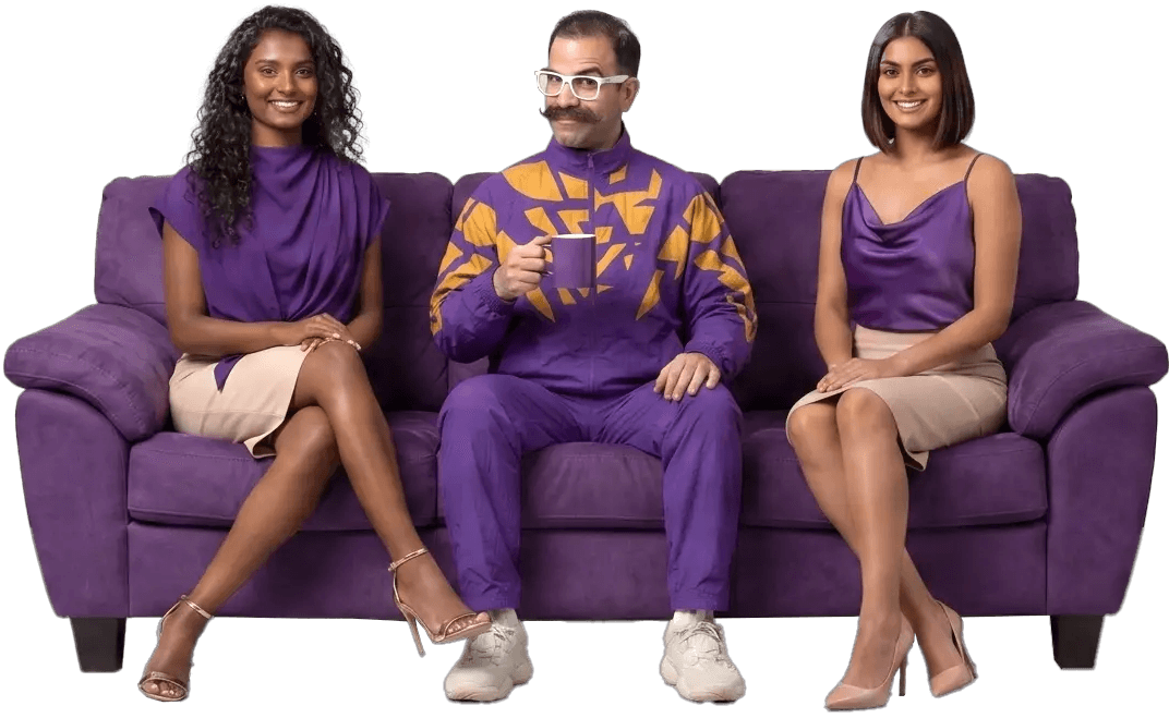 Brandaddy team sitting on a purple sofa with coffee mugs