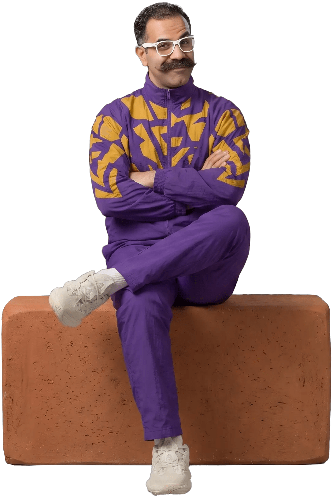 Brandaddy mascot sitting on a terracotta block